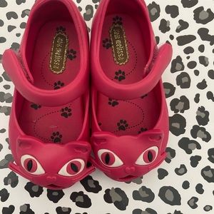 Super cute and gently used Mini Melissa Red  shoes!
